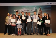 A group photo of 8 winners and prize presenting guests.